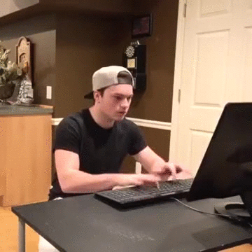 Guy slapping his keyboard