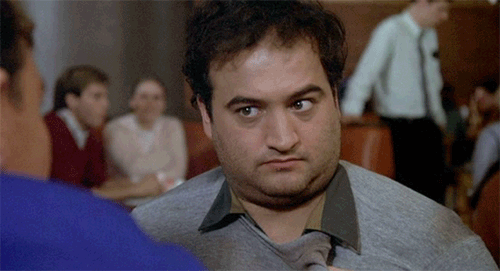 Jim Blukowsky from Animal House wiggling eyebrows.